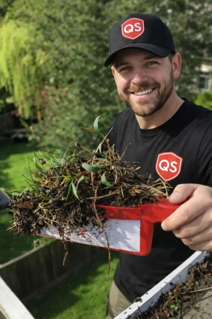 Quick Sidekick technician performing gutter cleaning service in Vancouver BC