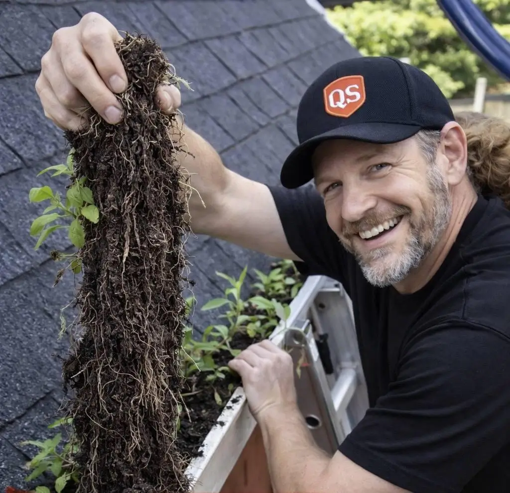 Quick Sidekick technician performing gutter cleaning service in Vancouver BC