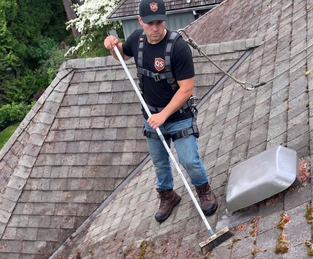 Quick Sidekick technician using an appropriate roof cleaning method in Vancouver