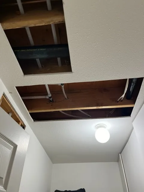 Before ceiling popcorn removal drywall repair in Burnaby showing rough textured popcorn ceiling surface