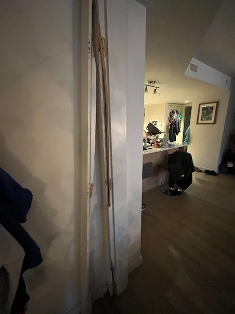 Before door frame repair in Burnaby showing damaged and broken door frame requiring professional repair service