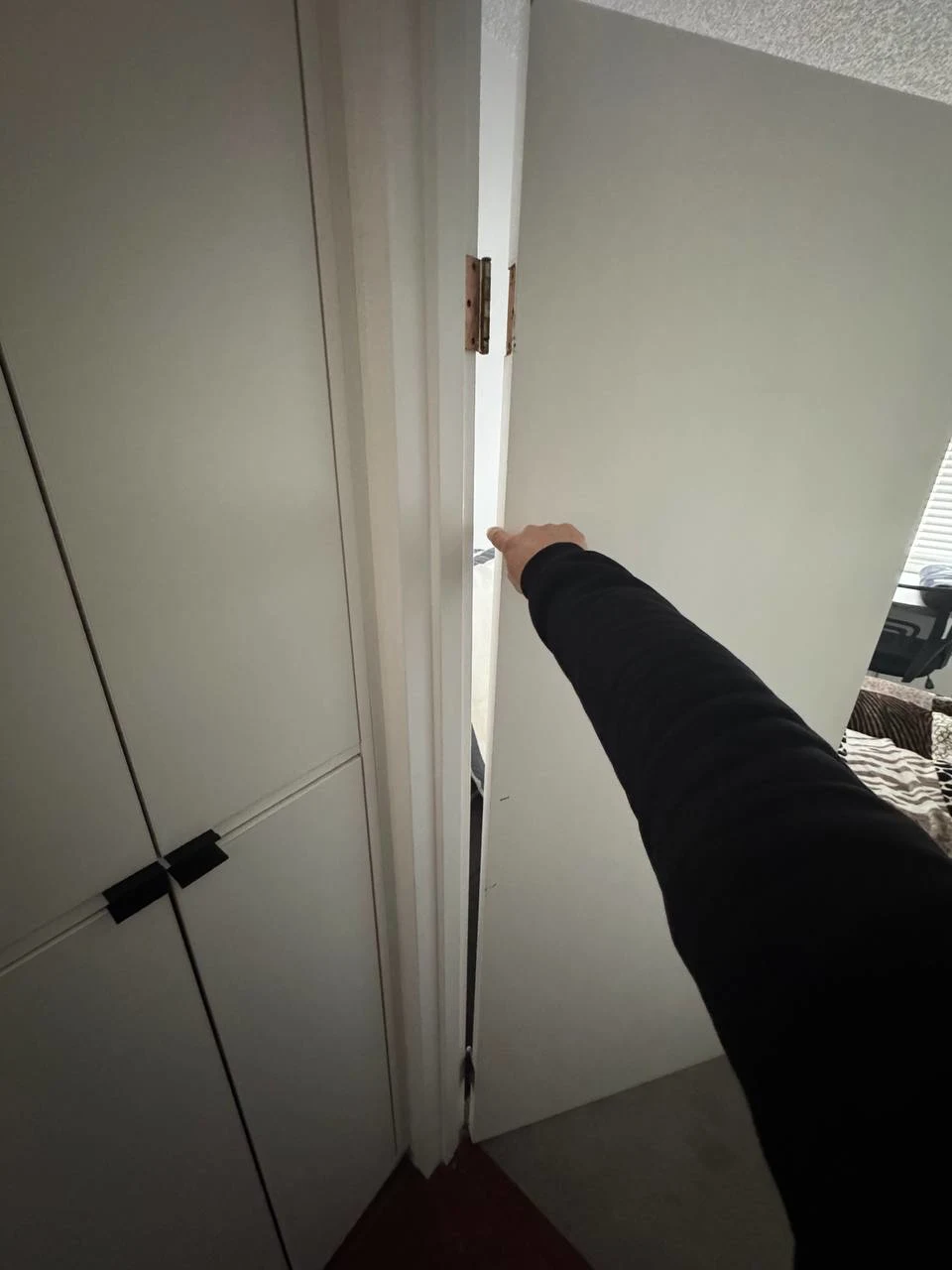 Before door hinges repair in Burnaby showing worn loose and damaged door hinges causing door misalignment and difficulty closing
