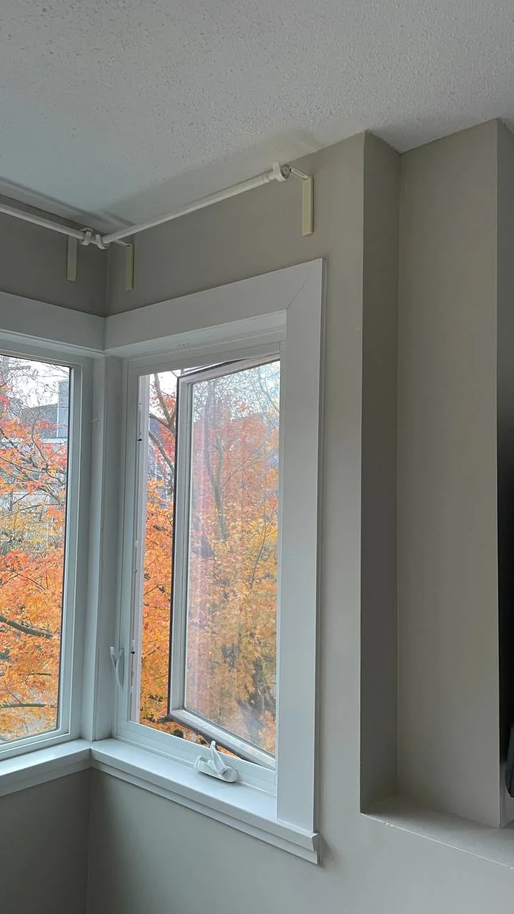 After drywall repair in Burnaby showing fully restored smooth wall with fresh paint and clean finish
