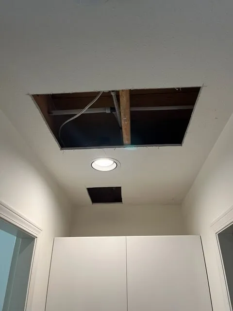 Before drywall repair on popcorn ceiling in Burnaby showing ceiling damage, cracks, and surface imperfections requiring professional restoration