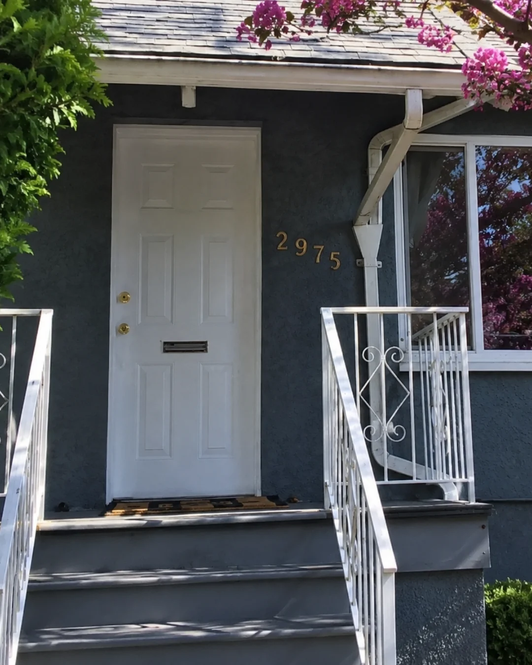 Before new front door installation in Burnaby showing old worn exterior door needing full replacement service