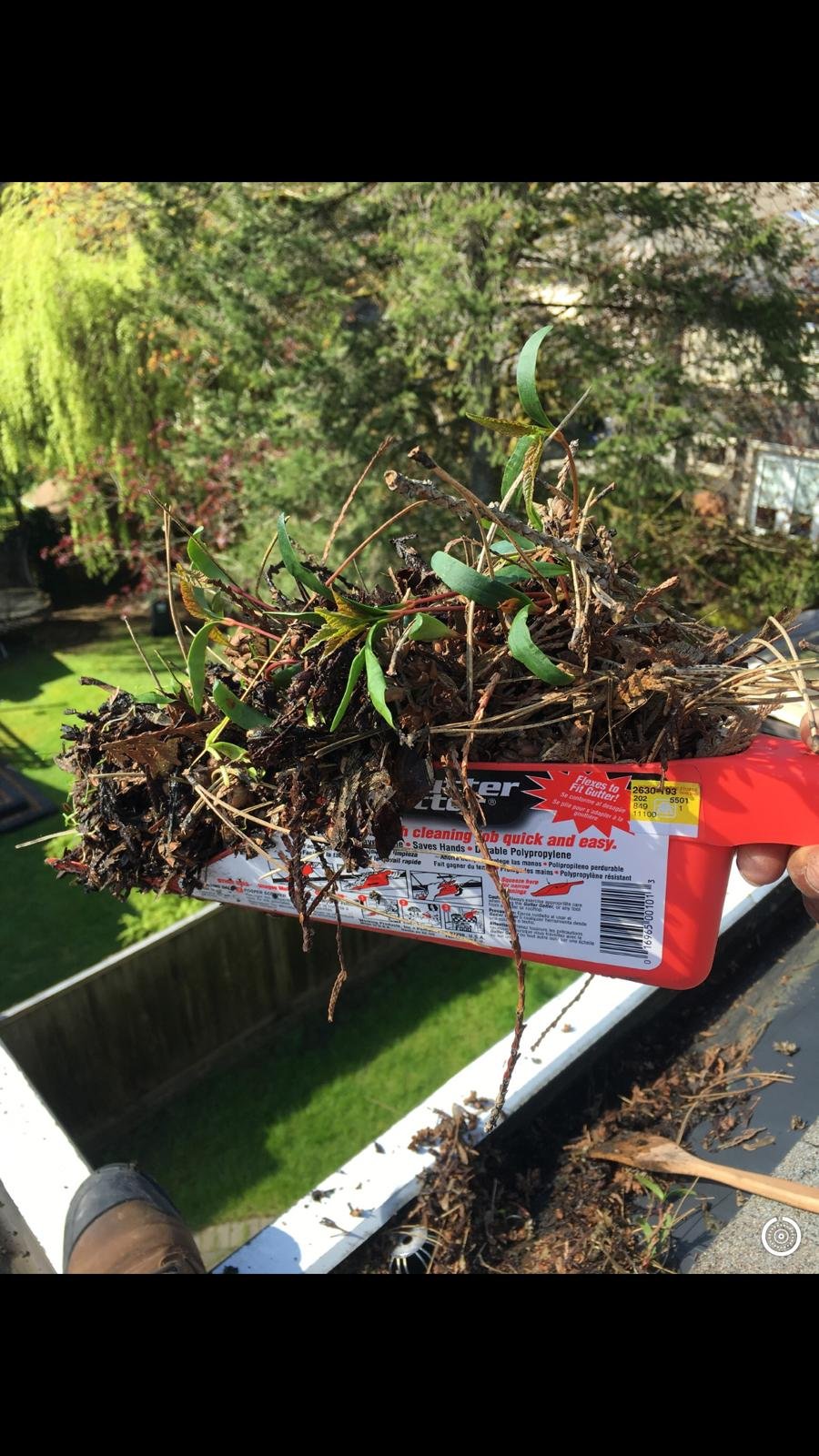Removing leaves and debris from commercial gutters