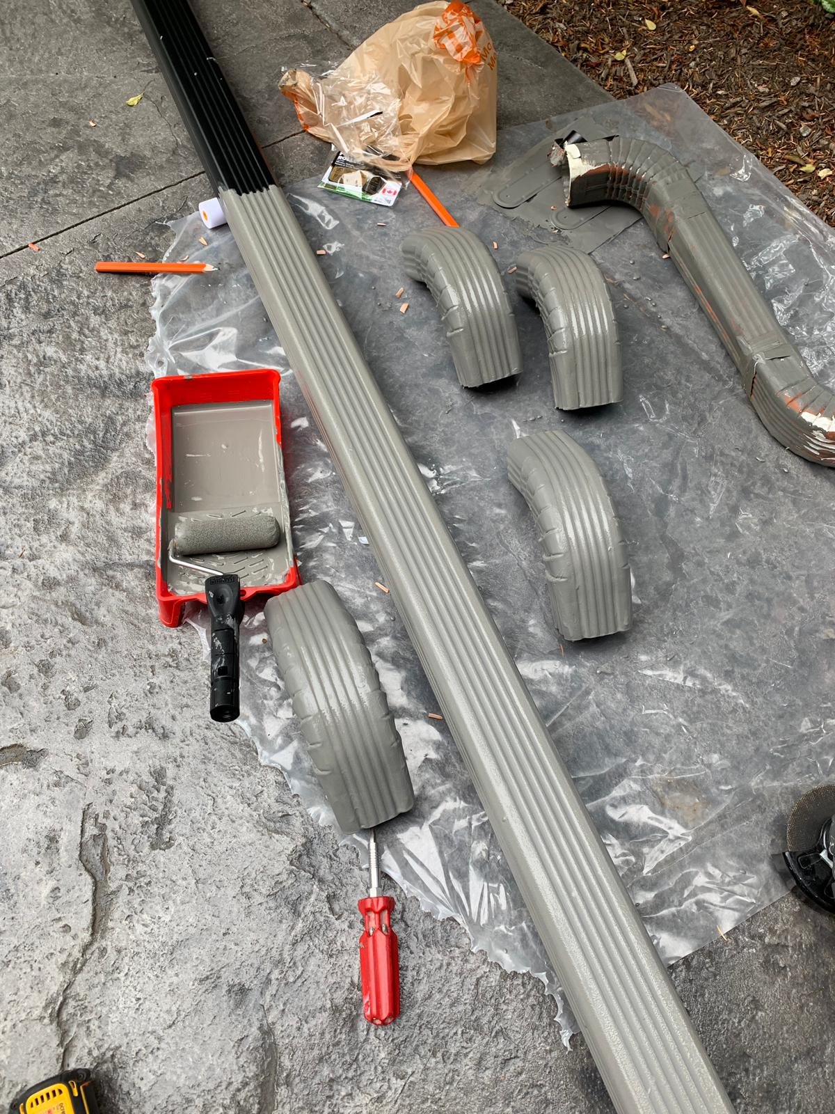 Painted downspout and gutter on a Vancouver home