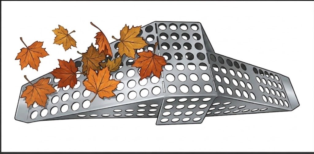 Gutter basket catching leaves and larger debris before it enters the downspout