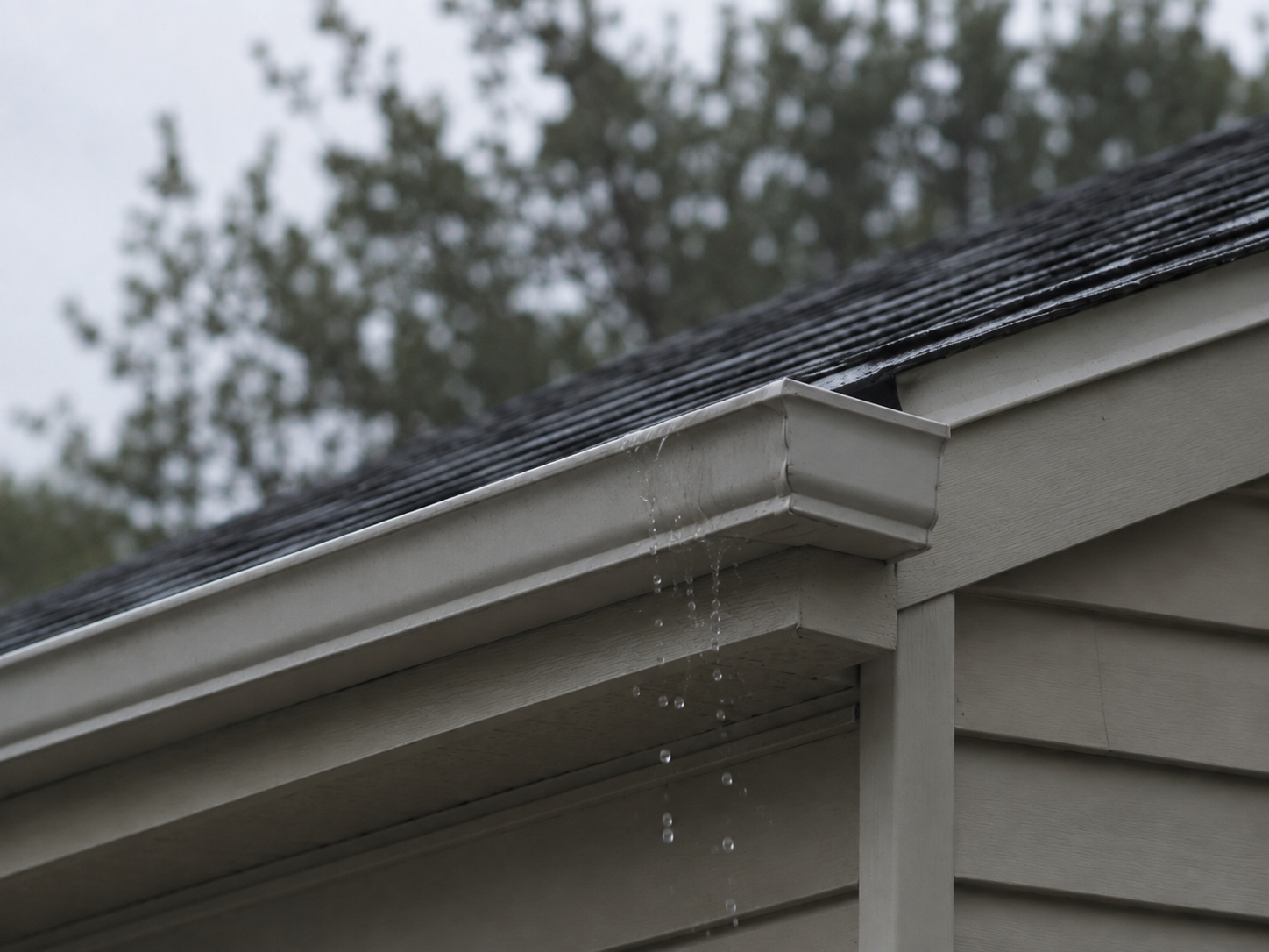 Gutter overflowing at the corner of a Vancouver home