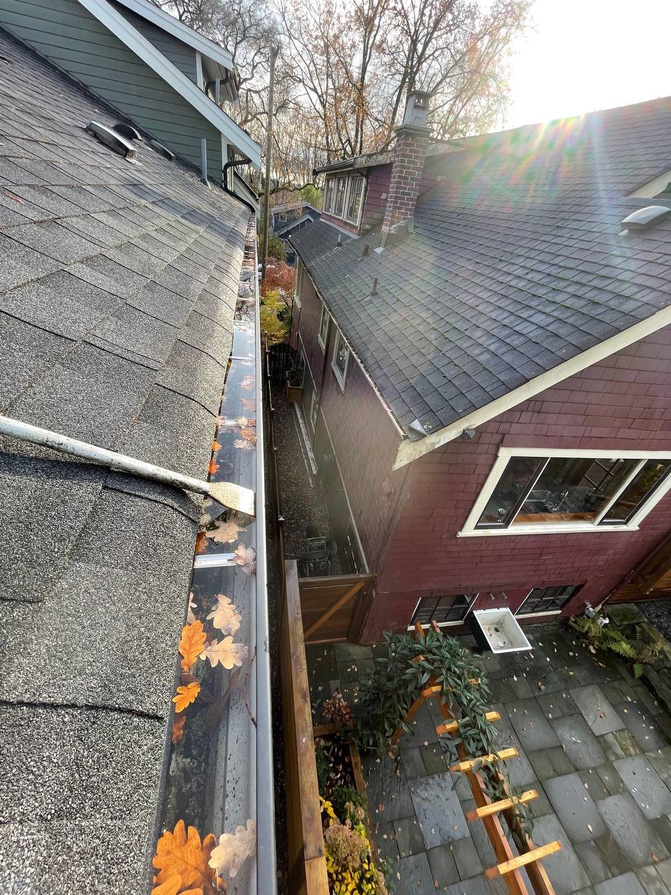 Standing water inside a gutter after rainfall