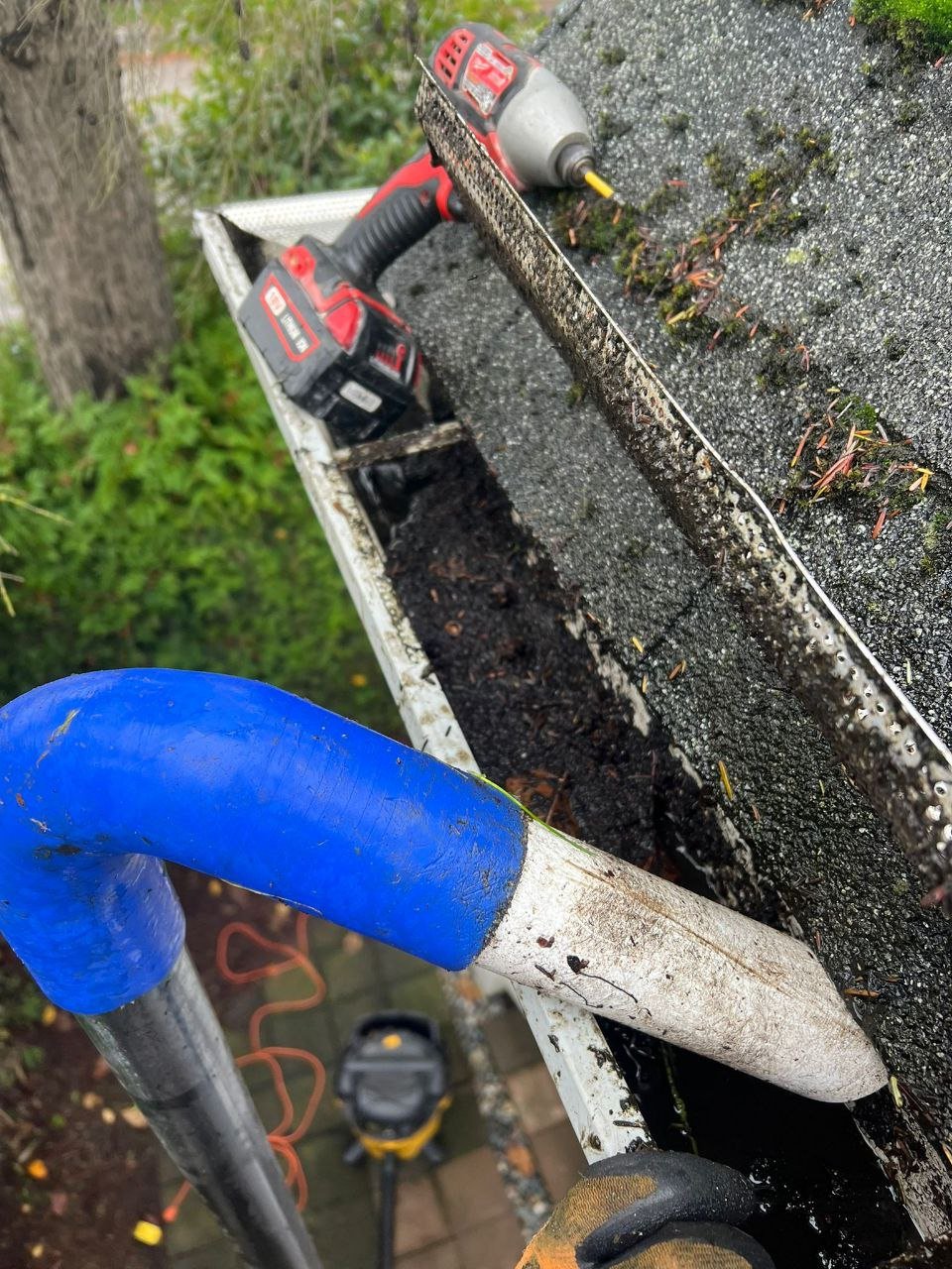 Professional gutter vacuum cleaning system in Vancouver
