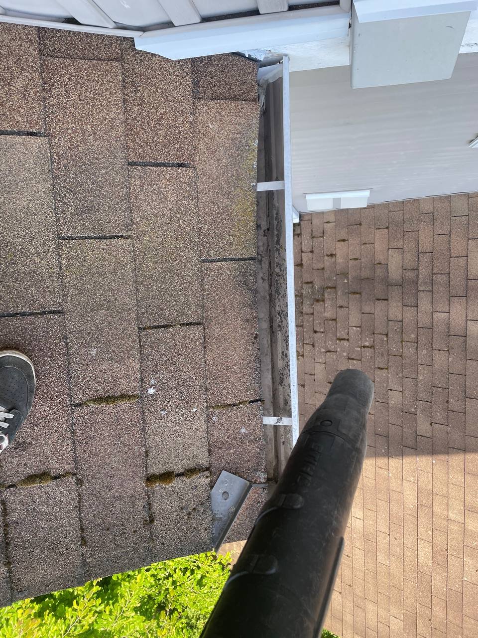 Professional gutter cleaning with a blower in Vancouver