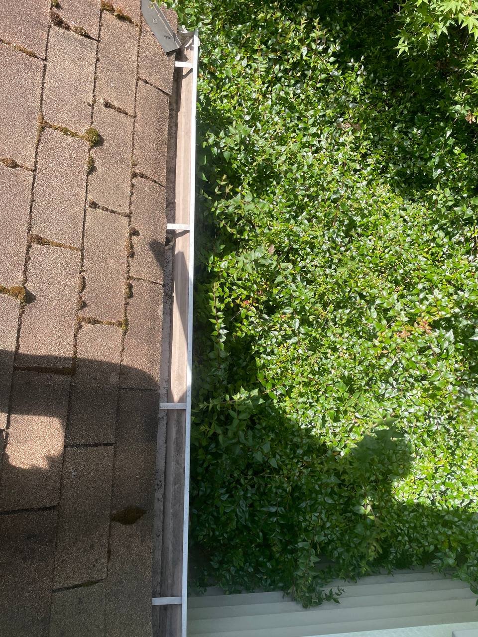 Gutter cleaning during dry summer weather in Vancouver