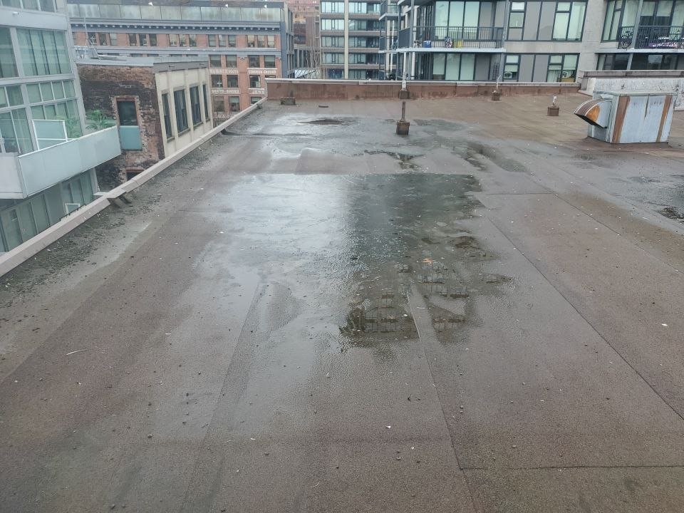 Commercial flat roof scheduled maintenance in Vancouver