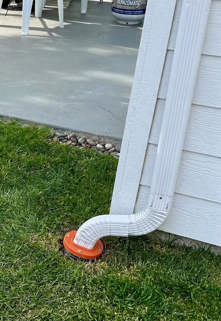 Clean downpipe connected to an underground drain