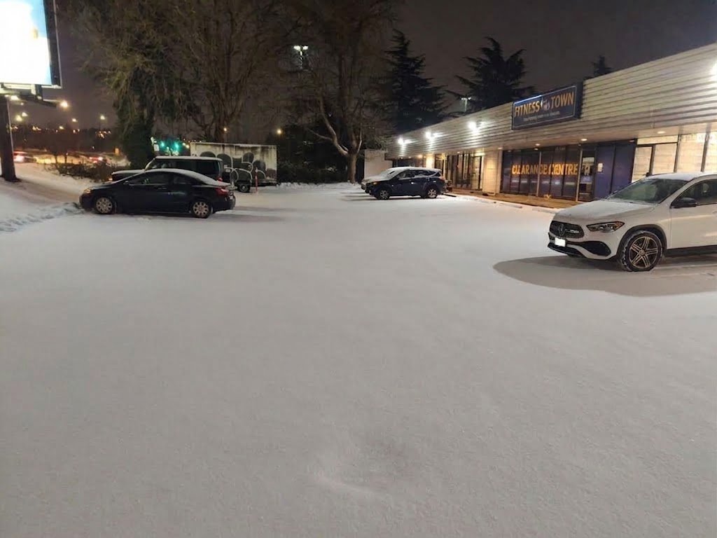 Commercial parking area before snow removal in Vancouver