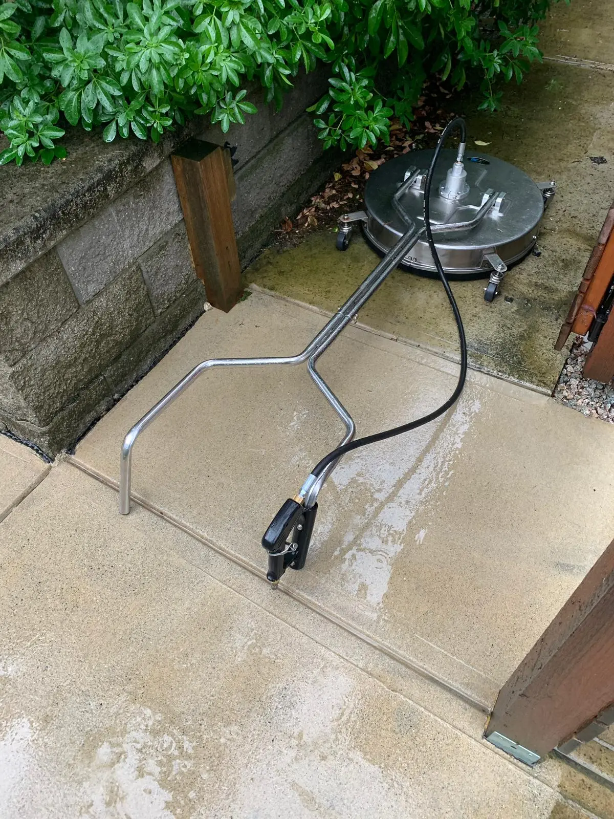 Professional pressure washing on a hard exterior surface in Vancouver