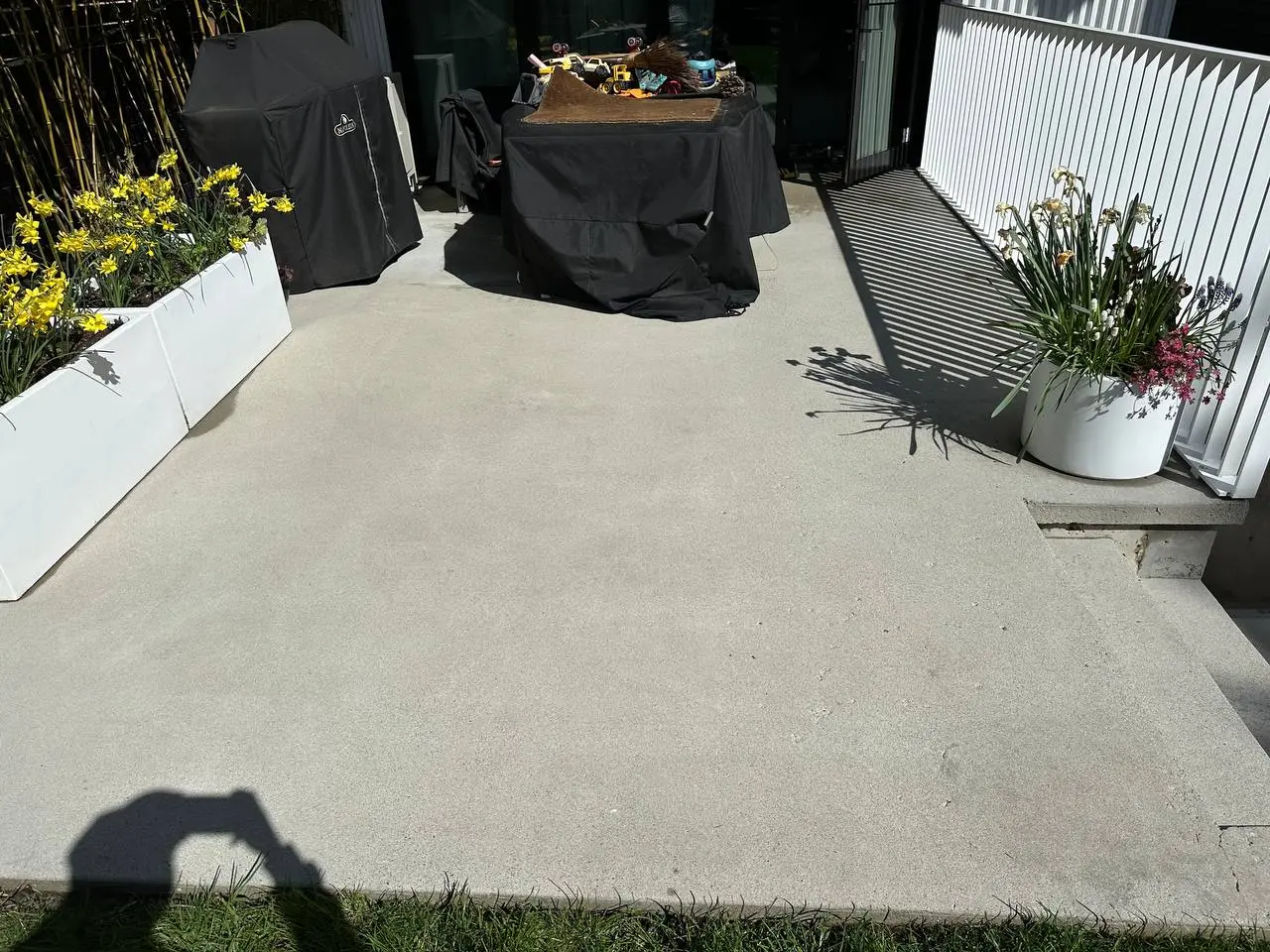 Concrete patio after professional pressure washing