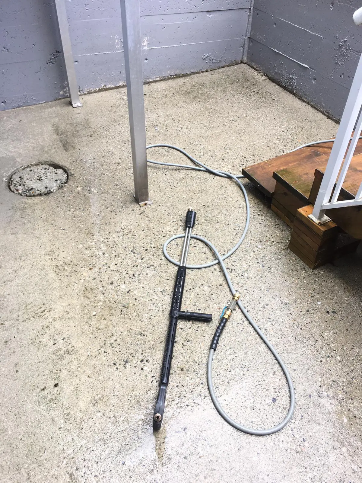 Concrete walkway after pressure washing