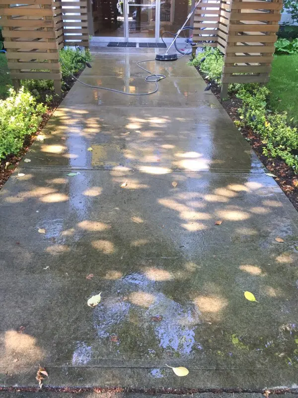 Concrete surface before pressure washing in Vancouver