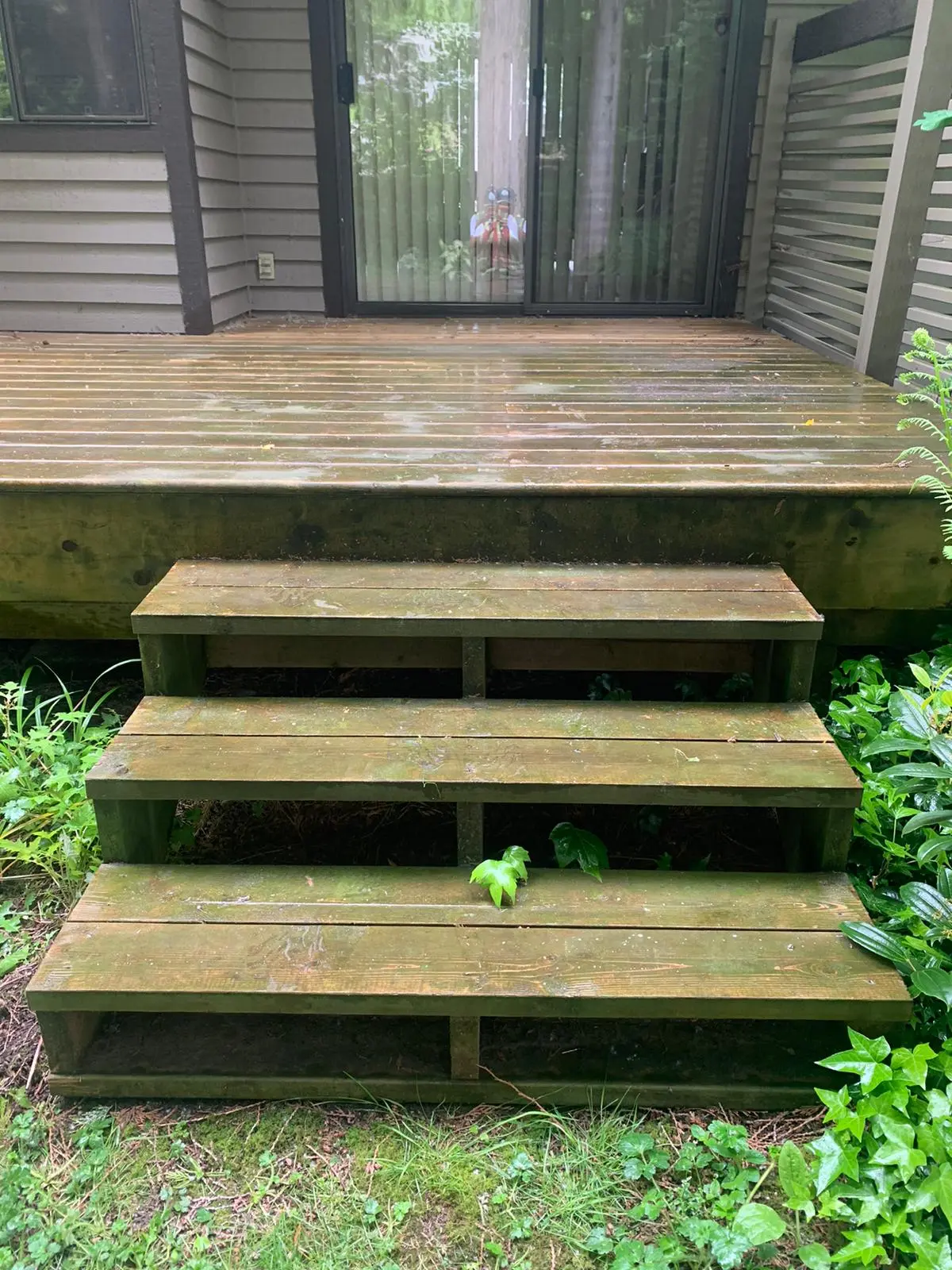 Wood deck before pressure washing
